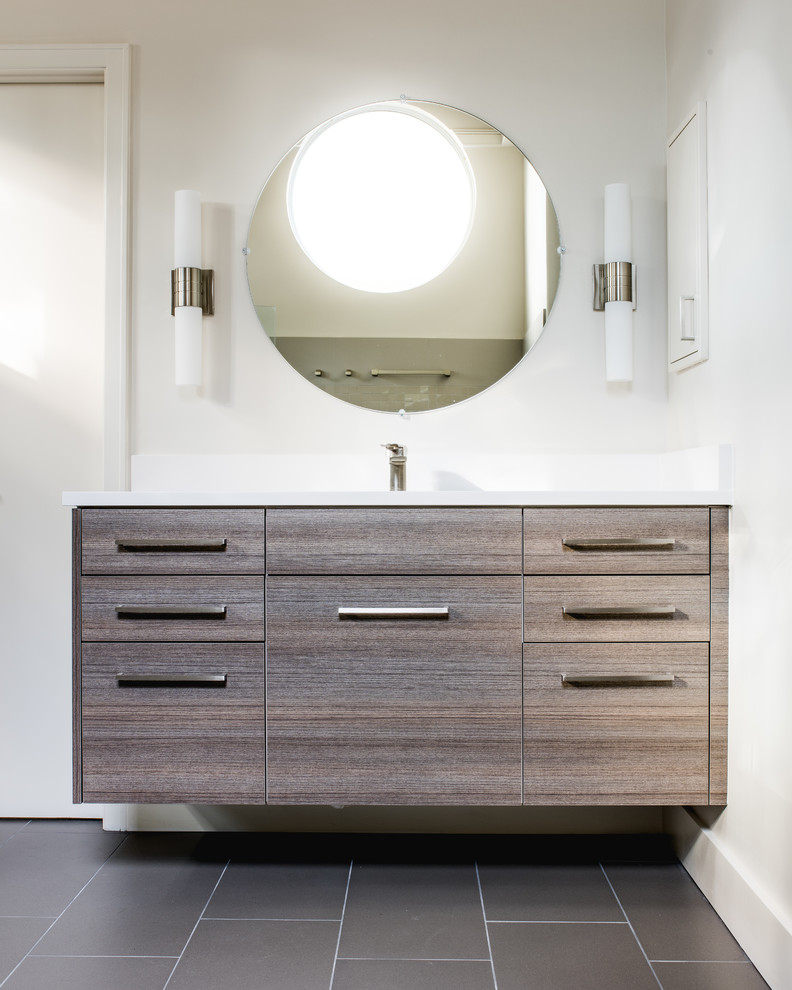 Inspiration for a large contemporary ensuite bathroom in Dallas with flat-panel cabinets, beige cabinets, a built-in shower, a two-piece toilet, grey tiles, porcelain tiles, white walls, porcelain flooring, a submerged sink and engineered stone worktops.