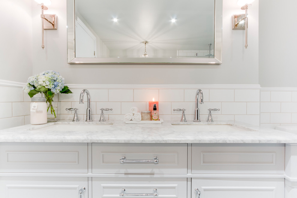 Bathroom - mid-sized contemporary master white tile and subway tile marble floor bathroom idea in Montreal with furniture-like cabinets, gray cabinets, a one-piece toilet, gray walls, an undermount sink and marble countertops