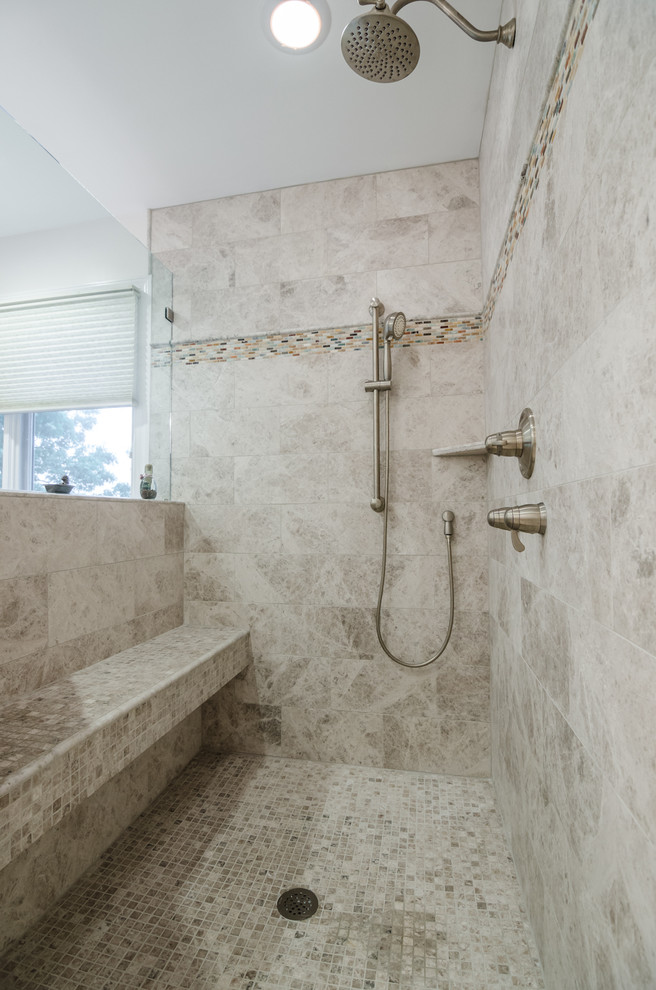 Inspiration for a large eclectic master gray tile and stone tile marble floor and white floor bathroom remodel in DC Metro with an undermount sink, raised-panel cabinets, medium tone wood cabinets, granite countertops, a two-piece toilet, white walls and a hinged shower door