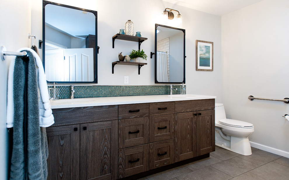 Bathroom - mid-sized industrial kids' white tile and subway tile porcelain tile bathroom idea in Seattle with recessed-panel cabinets, distressed cabinets, a one-piece toilet, white walls, an undermount sink and quartz countertops