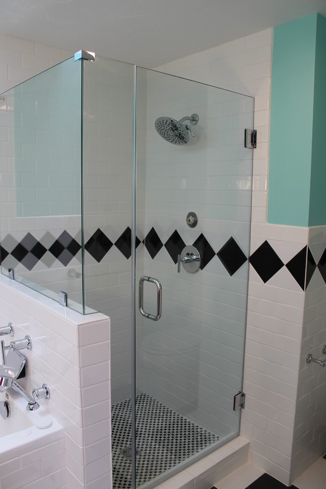 Medium sized contemporary shower room bathroom in Other with an alcove bath, an alcove shower, black and white tiles, metro tiles, blue walls, vinyl flooring, black floors and a hinged door.