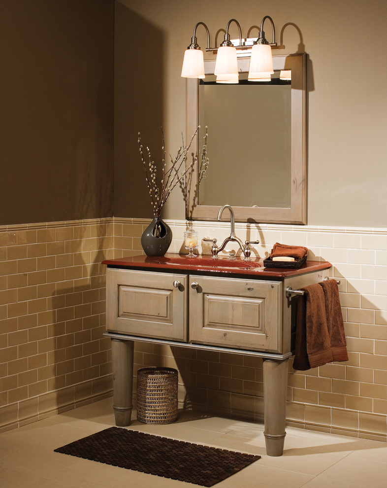 This is an example of a small traditional bathroom in Minneapolis with an integrated sink, beige tiles and brown walls.
