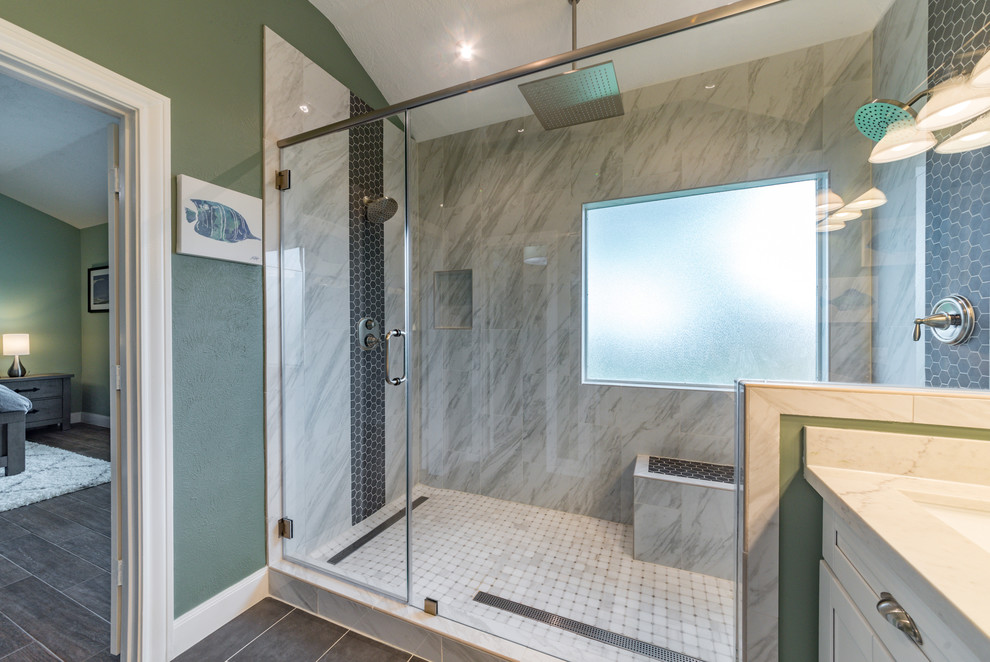 Inspiration for a large classic ensuite bathroom in Houston with shaker cabinets, white cabinets, a double shower, grey tiles, porcelain tiles, green walls, porcelain flooring, a submerged sink, quartz worktops, grey floors and a hinged door.