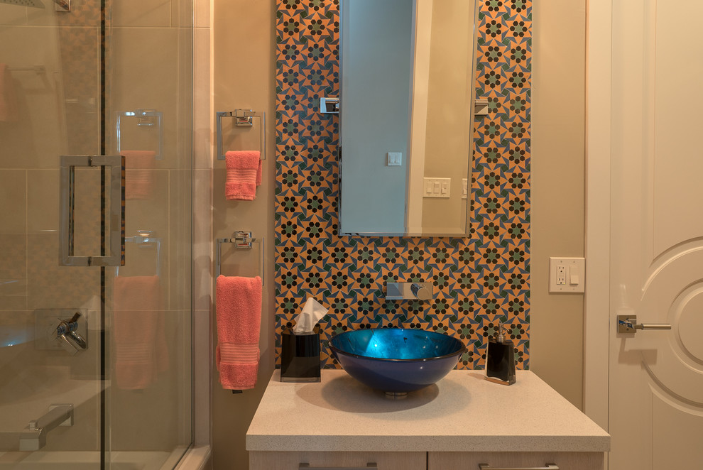 Mid-sized trendy 3/4 blue tile, orange tile and glass tile corner shower photo in Phoenix with a vessel sink, furniture-like cabinets, beige walls and a hinged shower door