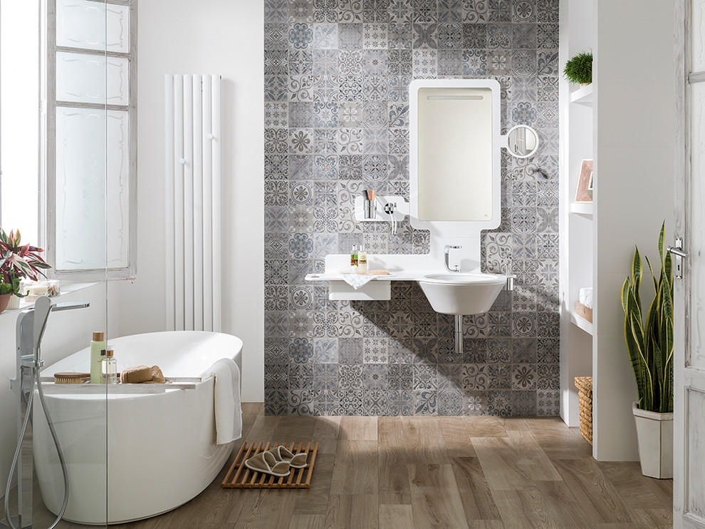 Mid-sized trendy master gray tile porcelain tile bathroom photo in Orange County with open cabinets, white cabinets, gray walls and a wall-mount sink