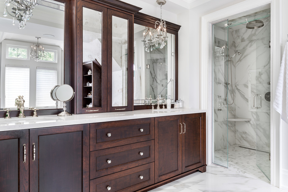 Large traditional ensuite bathroom in Toronto with dark wood cabinets, a built-in bath, white tiles, marble flooring, a submerged sink, quartz worktops, an alcove shower, recessed-panel cabinets, a one-piece toilet, porcelain tiles, white walls and a hinged door.