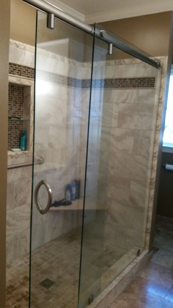 This is an example of a medium sized traditional shower room bathroom in New York with an alcove shower, brown walls and ceramic flooring.