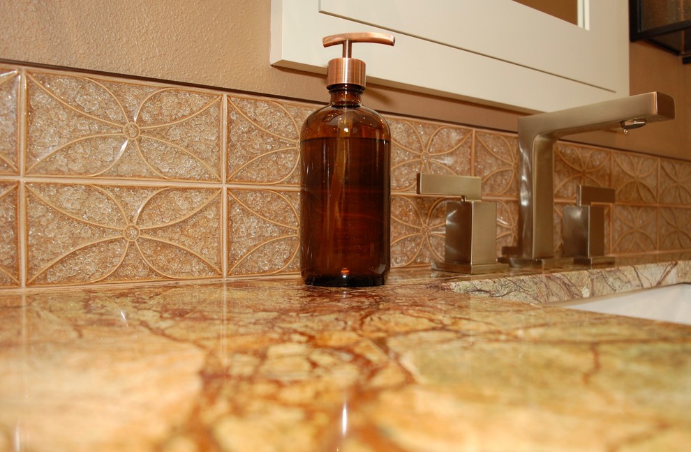 Example of a mid-sized transitional master brown tile and ceramic tile travertine floor and beige floor bathroom design in Portland with shaker cabinets, white cabinets, a two-piece toilet, brown walls, an undermount sink, onyx countertops and a hinged shower door