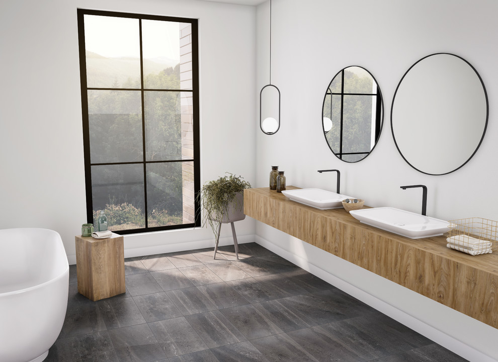 Inspiration för ett funkis badrum, med kalkstensgolv och grått golv