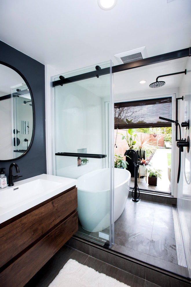 Coastal wet room bathroom in San Francisco with a japanese bath, white tiles, stone slabs, grey walls, ceramic flooring, a wall-mounted sink, grey floors, a sliding door and white worktops.