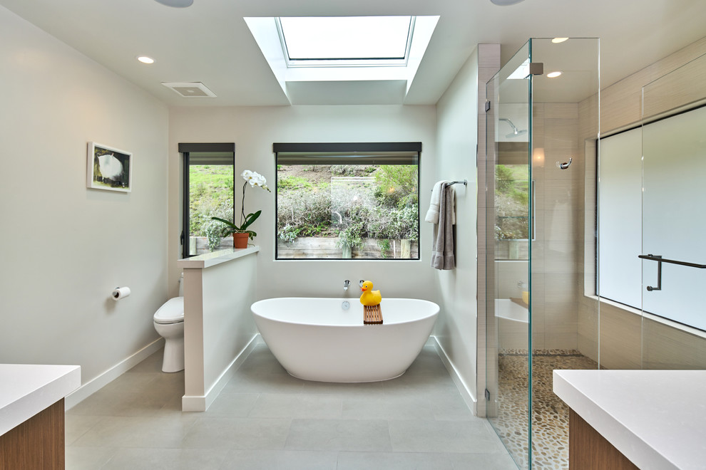 Example of a trendy master bathroom design in San Francisco with a hinged shower door
