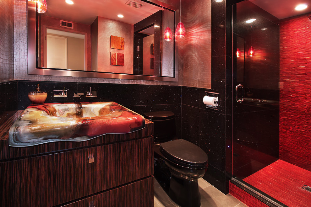 На фото: ванная комната в современном стиле с накладной раковиной, плоскими фасадами, душем в нише, красной плиткой и удлиненной плиткой