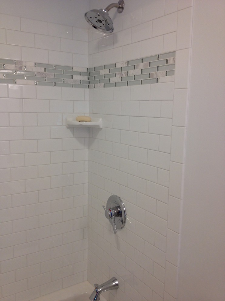 Example of a small transitional master white tile and porcelain tile porcelain tile bathroom design in Other with a two-piece toilet, white walls and a pedestal sink
