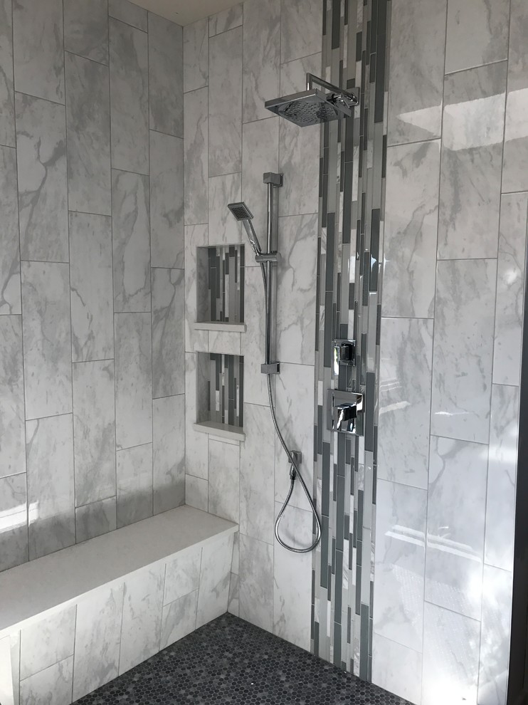 Inspiration for a mid-sized modern master black and white tile mosaic tile floor and black floor corner shower remodel in Chicago