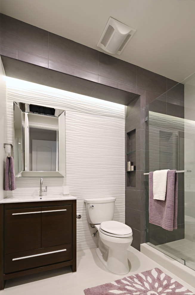 Inspiration for a large contemporary kids' gray tile and porcelain tile porcelain tile bathroom remodel in Atlanta with an undermount sink, flat-panel cabinets, dark wood cabinets and an undermount tub