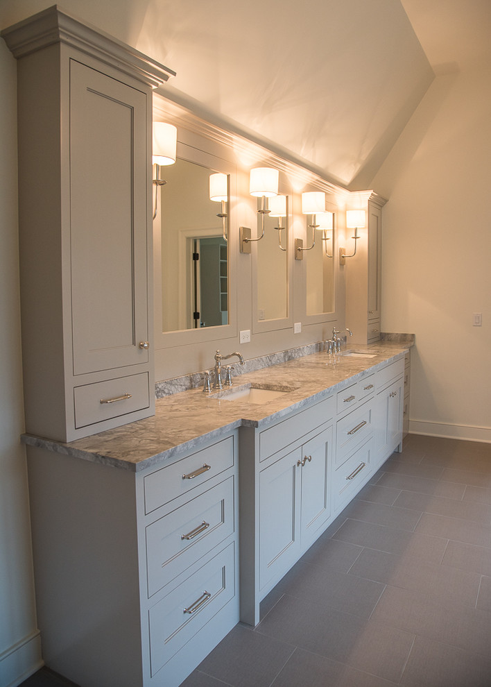 Example of a transitional master porcelain tile and gray floor bathroom design in Chicago with recessed-panel cabinets, gray cabinets, an undermount sink and quartzite countertops