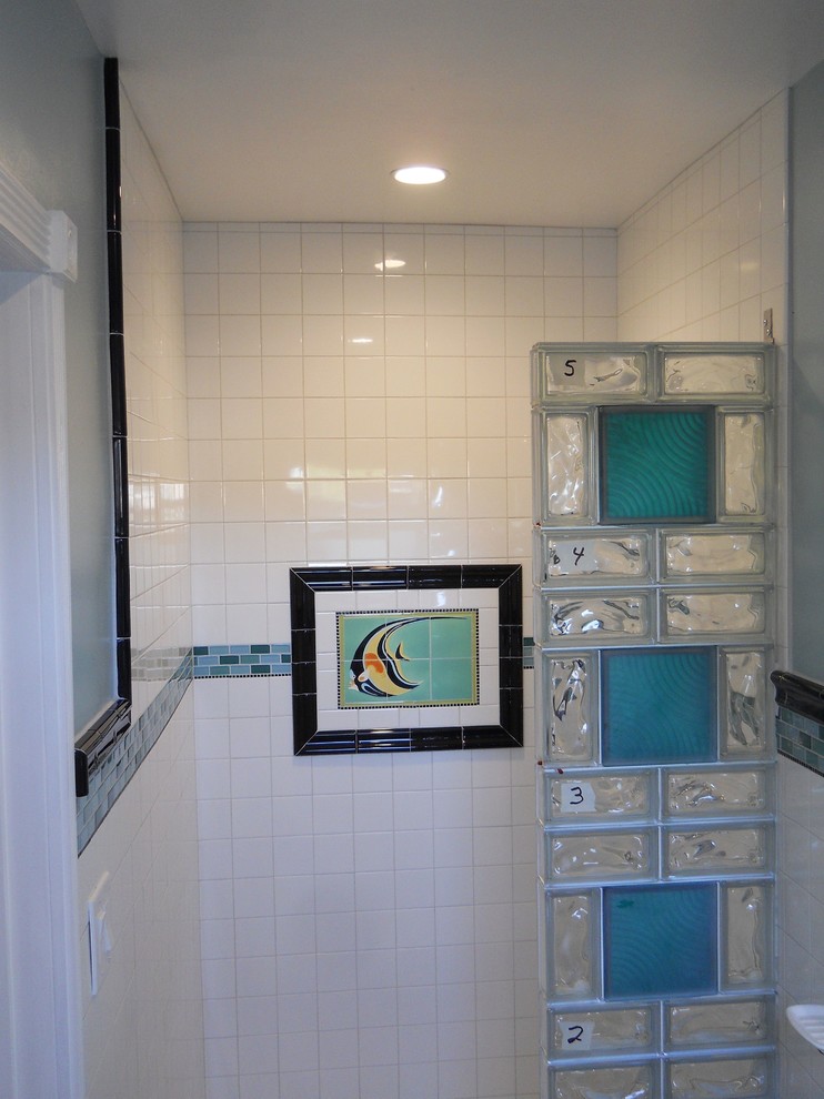 Design ideas for a small beach style ensuite bathroom in San Diego with an alcove shower, green tiles, glass tiles and green walls.
