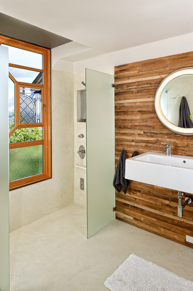 Inspiration for a contemporary bathroom remodel in Seattle with a wall-mount sink