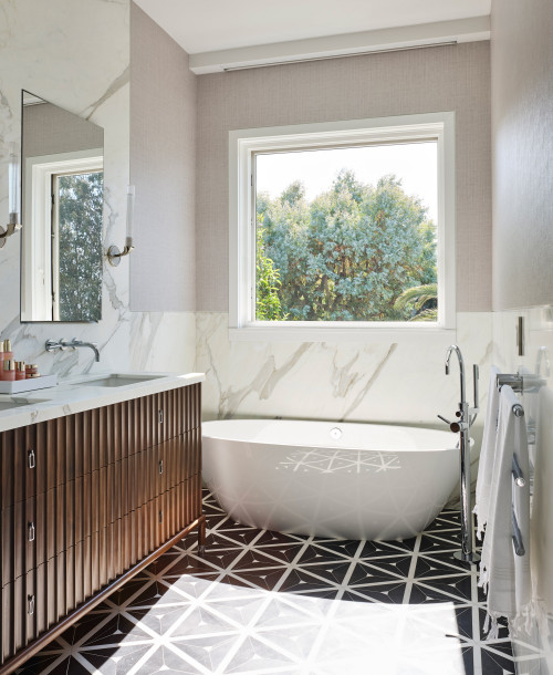 Elegant Master Bathroom with Wood Vanity and Quartz Countertop