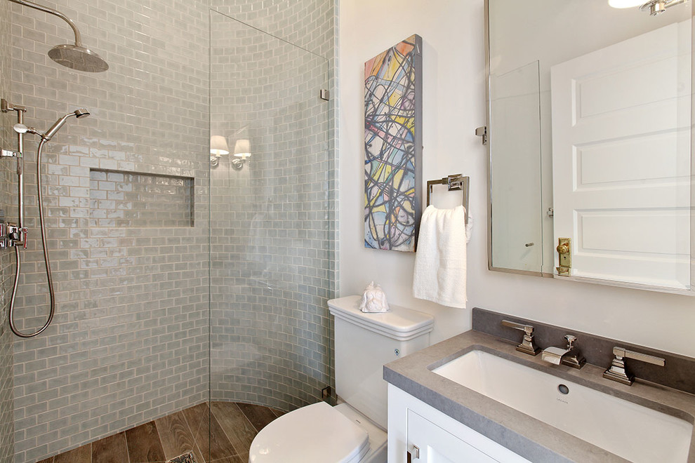 Inspiration for a huge transitional kids' ceramic tile and gray tile porcelain tile and brown floor alcove shower remodel in San Francisco with recessed-panel cabinets, white cabinets, a two-piece toilet, white walls, an undermount sink, marble countertops and a hinged shower door