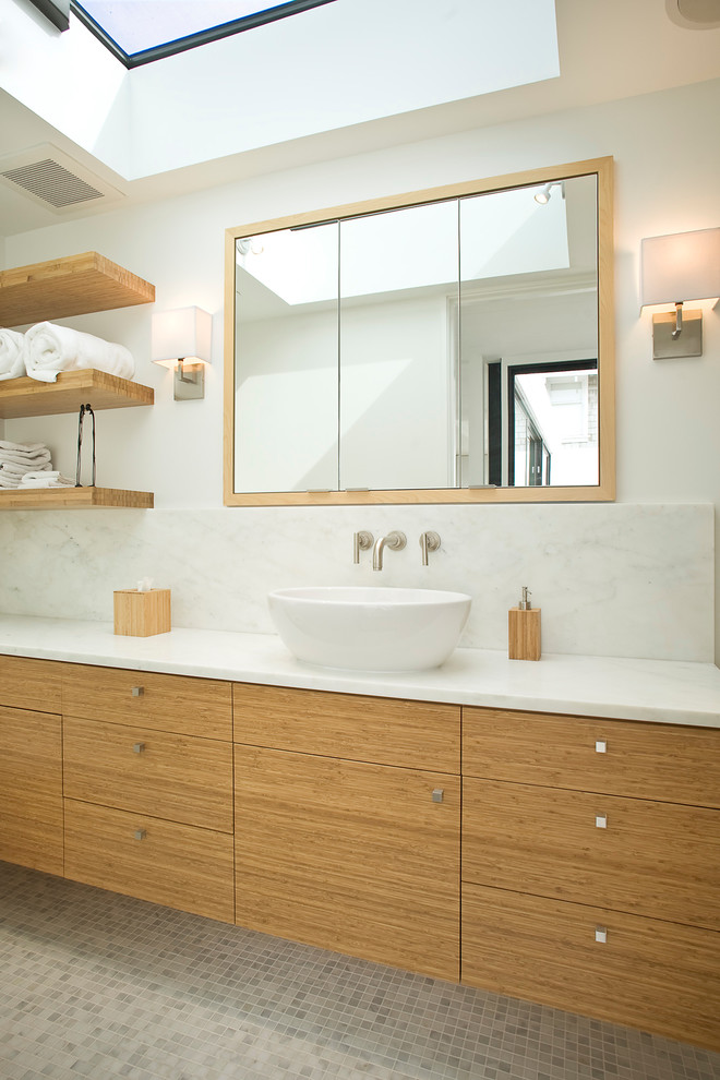 Contemporary bathroom in San Francisco with mosaic tiles and a vessel sink.