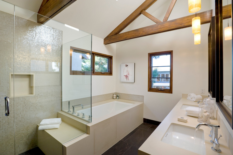 This is an example of a contemporary bathroom in Los Angeles with mosaic tiles.