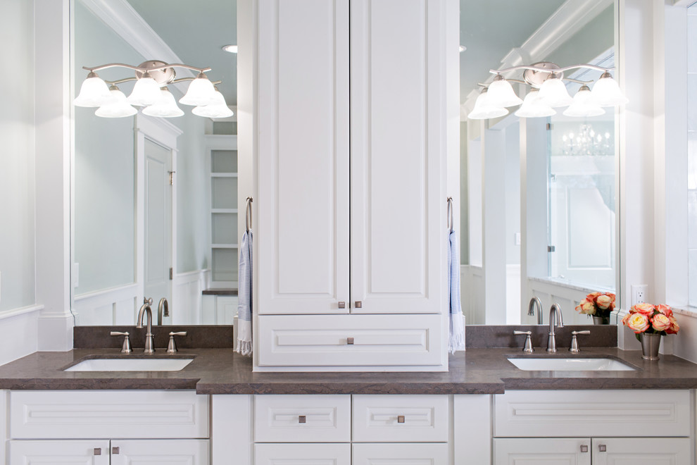 Bathroom - huge traditional master white tile and porcelain tile marble floor bathroom idea in Denver with an undermount sink, raised-panel cabinets, white cabinets, limestone countertops, a two-piece toilet and green walls