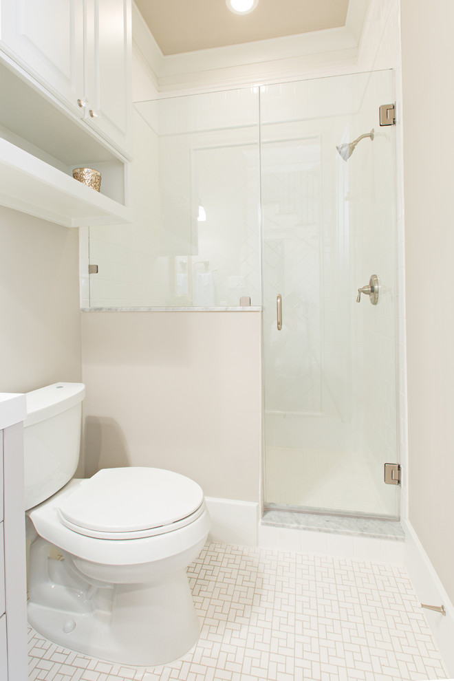 Small elegant 3/4 white tile and porcelain tile mosaic tile floor doorless shower photo in Denver with an undermount sink, beaded inset cabinets, quartzite countertops, a two-piece toilet, gray walls and white cabinets