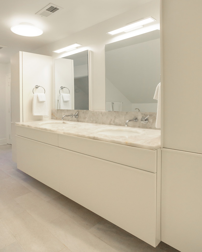 Example of a mid-sized trendy master bathroom design in Philadelphia with flat-panel cabinets, white cabinets, quartzite countertops and multicolored countertops