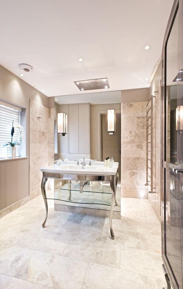 Diseño de cuarto de baño actual de tamaño medio con baldosas y/o azulejos de mármol, suelo de mármol y lavabo sobreencimera