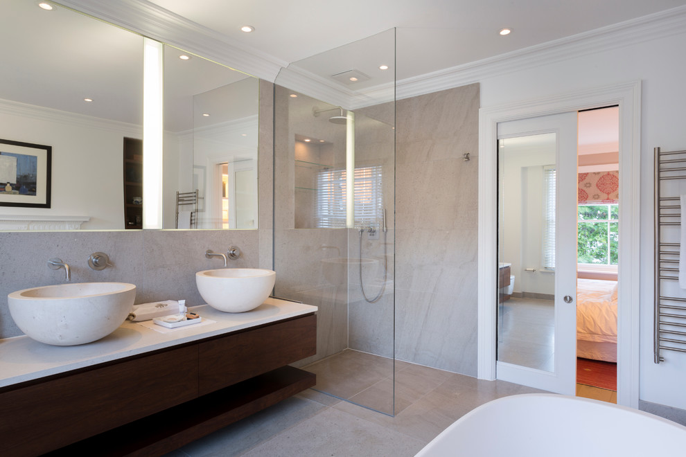 Photo of a medium sized contemporary ensuite bathroom in London with dark wood cabinets, a walk-in shower, beige tiles, stone slabs, white walls, marble flooring, marble worktops, a vessel sink and an open shower.