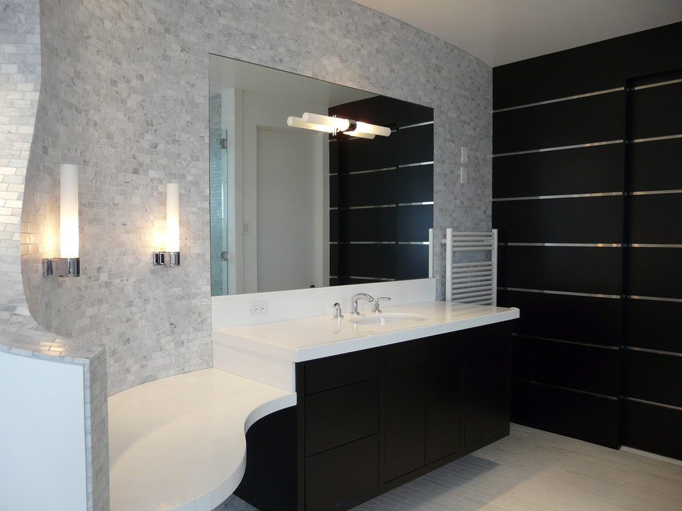 Large contemporary bathroom in Orange County with flat-panel cabinets, black cabinets, blue tiles, grey tiles, white tiles, metro tiles, grey walls, ceramic flooring, a submerged sink and granite worktops.