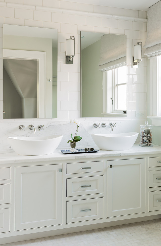 This is an example of a medium sized traditional bathroom in Boston with a vessel sink, white cabinets, marble worktops, white tiles, metro tiles, grey walls, ceramic flooring and recessed-panel cabinets.