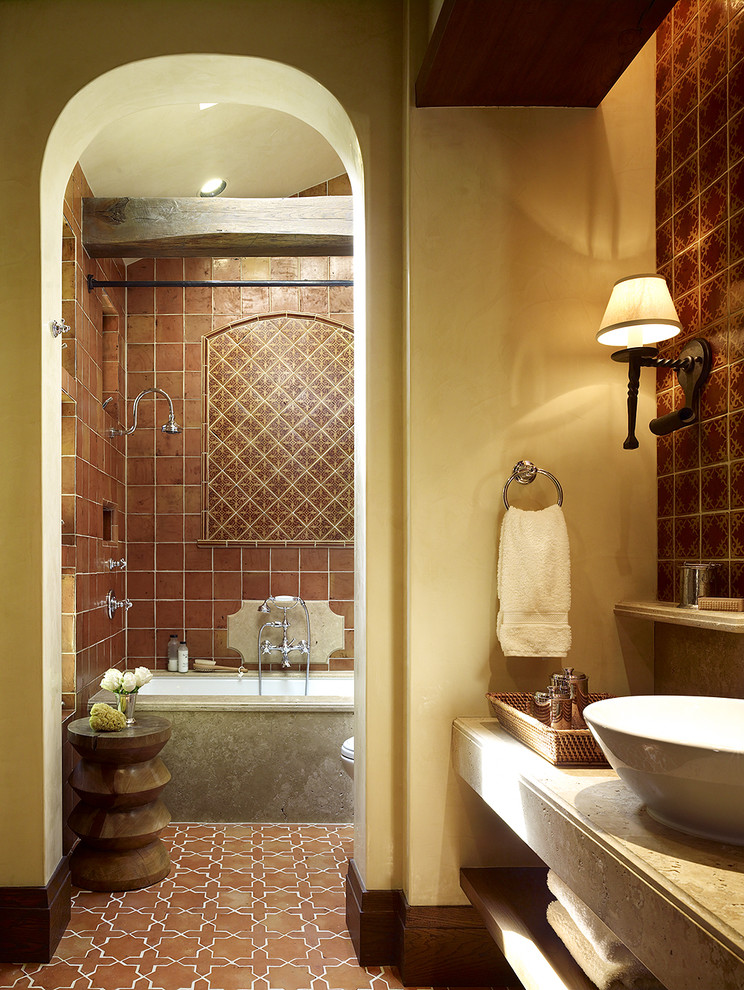 Example of a tuscan terra-cotta tile terra-cotta tile and brown floor bathroom design in San Francisco with a vessel sink