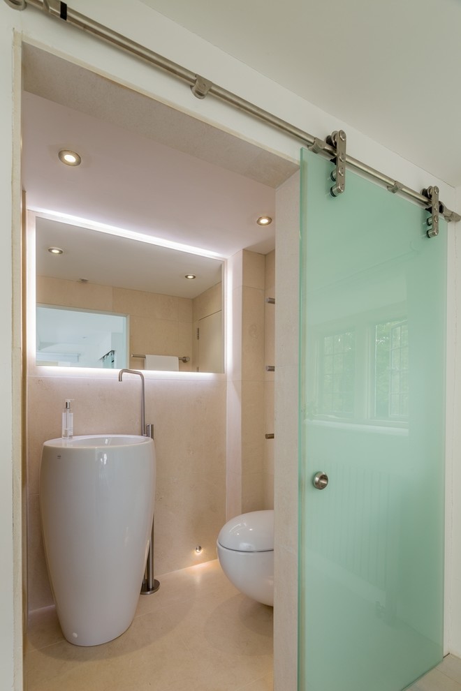 This is an example of a contemporary bathroom in Gloucestershire with a freestanding bath.