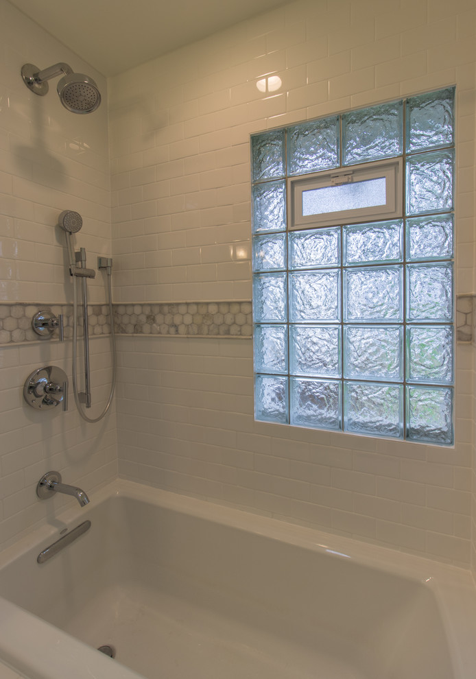 Bathroom - mid-sized transitional master white tile and subway tile marble floor and white floor bathroom idea in Minneapolis with recessed-panel cabinets, white cabinets, a one-piece toilet, blue walls, an undermount sink, quartz countertops and white countertops