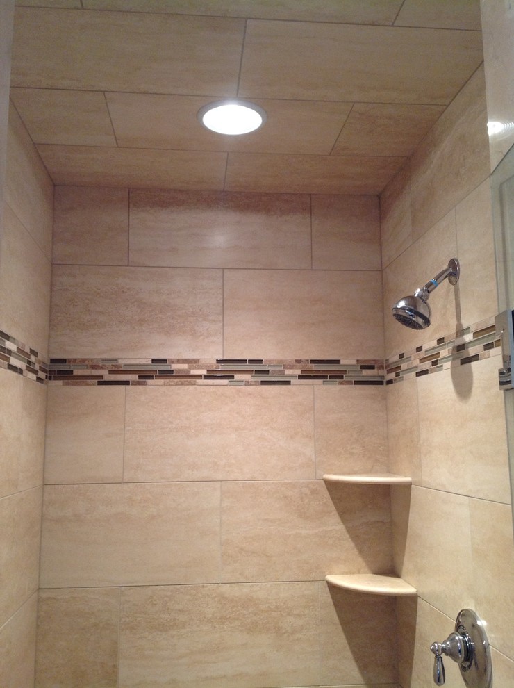 Inspiration for a timeless beige tile and porcelain tile bathroom remodel in Boston