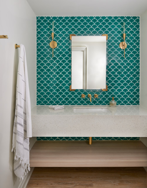 Green Fish Scale Tiles with Floating Vanity and Brass Sconces