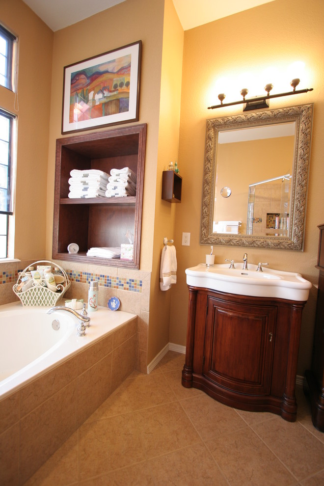 Cette image montre une salle de bain principale traditionnelle en bois foncé de taille moyenne avec un placard en trompe-l'oeil, une baignoire en alcôve, une douche d'angle, un carrelage beige, des carreaux de céramique, un mur marron, un sol en carrelage de céramique, un lavabo intégré, un plan de toilette en surface solide, un sol beige et une cabine de douche à porte battante.