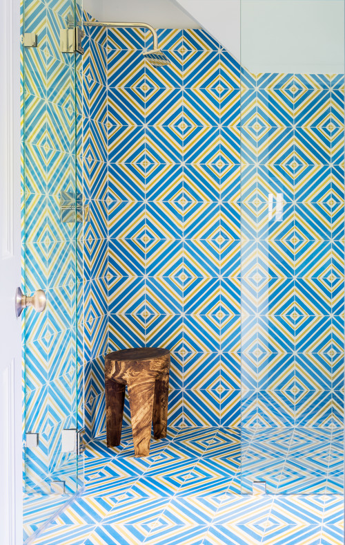 Geometric Beauty: Beach Style Walk-in Shower with Blue and Yellow Geometric Tile