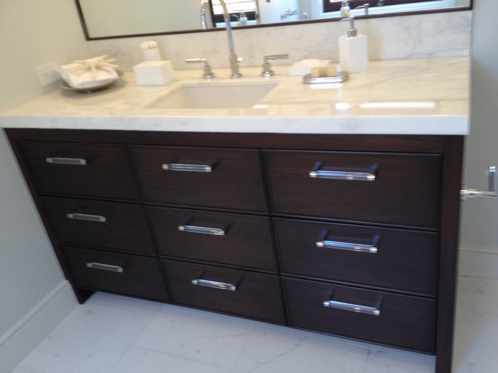 Small classic ensuite bathroom in San Francisco with flat-panel cabinets, dark wood cabinets, a shower/bath combination, a two-piece toilet, beige tiles, matchstick tiles, white walls, marble flooring, a submerged sink and marble worktops.