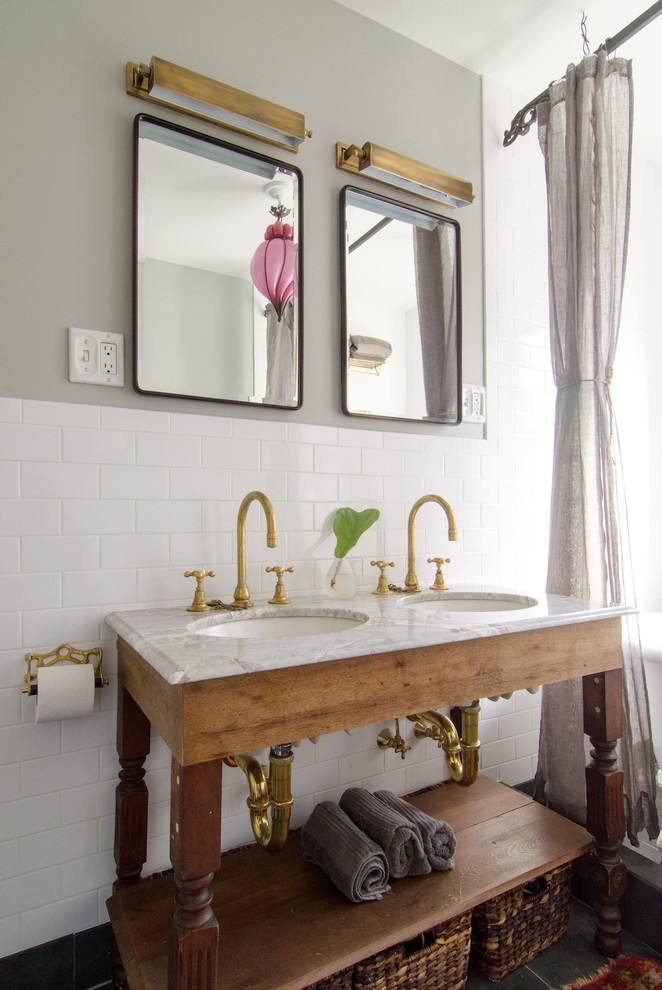 Cottage chic white tile and subway tile bathroom photo in New York with an undermount sink, open cabinets and gray walls