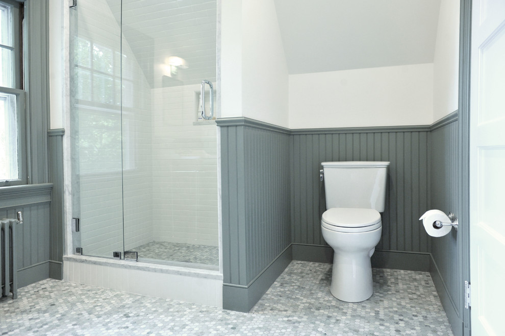 Inspiration for a mid-sized timeless 3/4 white tile marble floor alcove shower remodel in Providence with green walls, a console sink, recessed-panel cabinets and a two-piece toilet