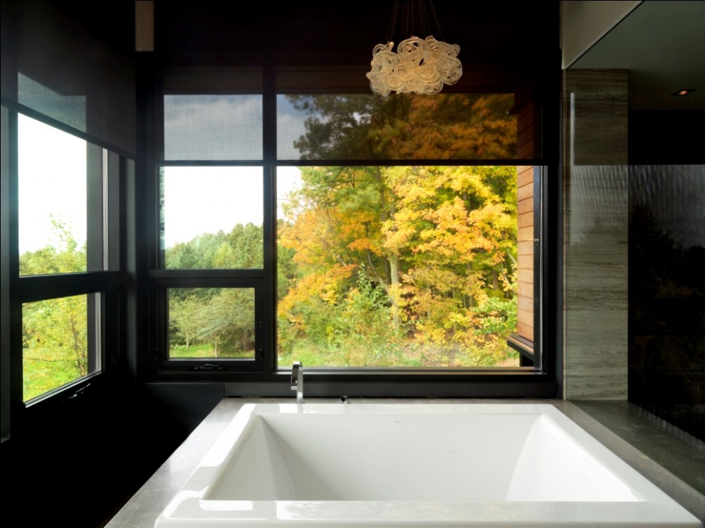 Inspiration for a huge contemporary master drop-in bathtub remodel in Burlington