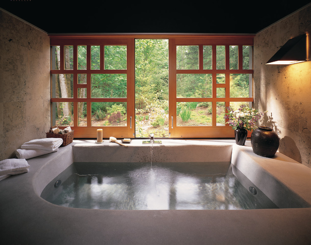 Example of a zen beige tile bathroom design in Seattle