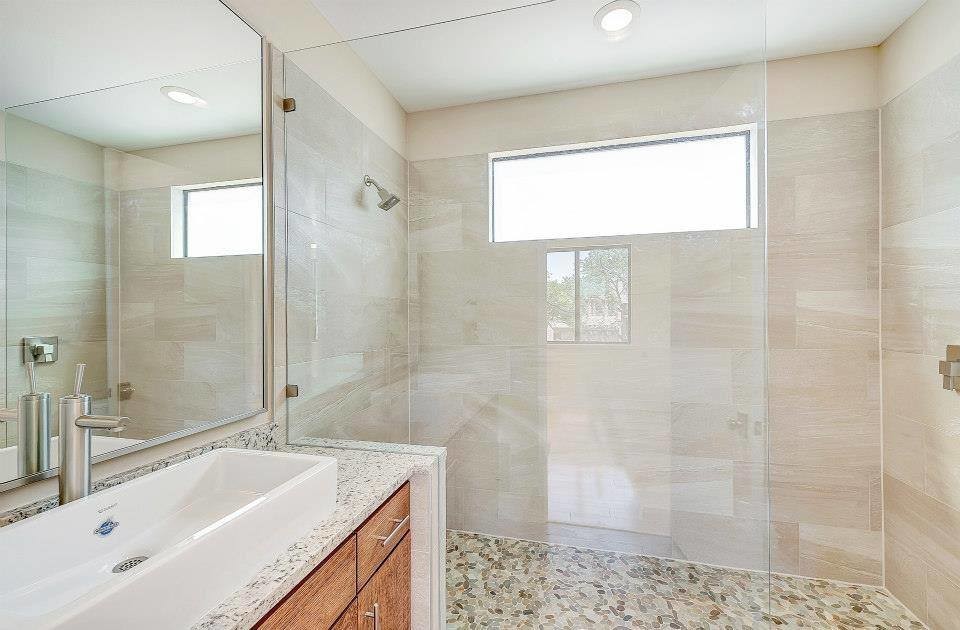 Example of a mid-sized minimalist kids' bathroom design in Dallas with a vessel sink, quartz countertops and beige walls
