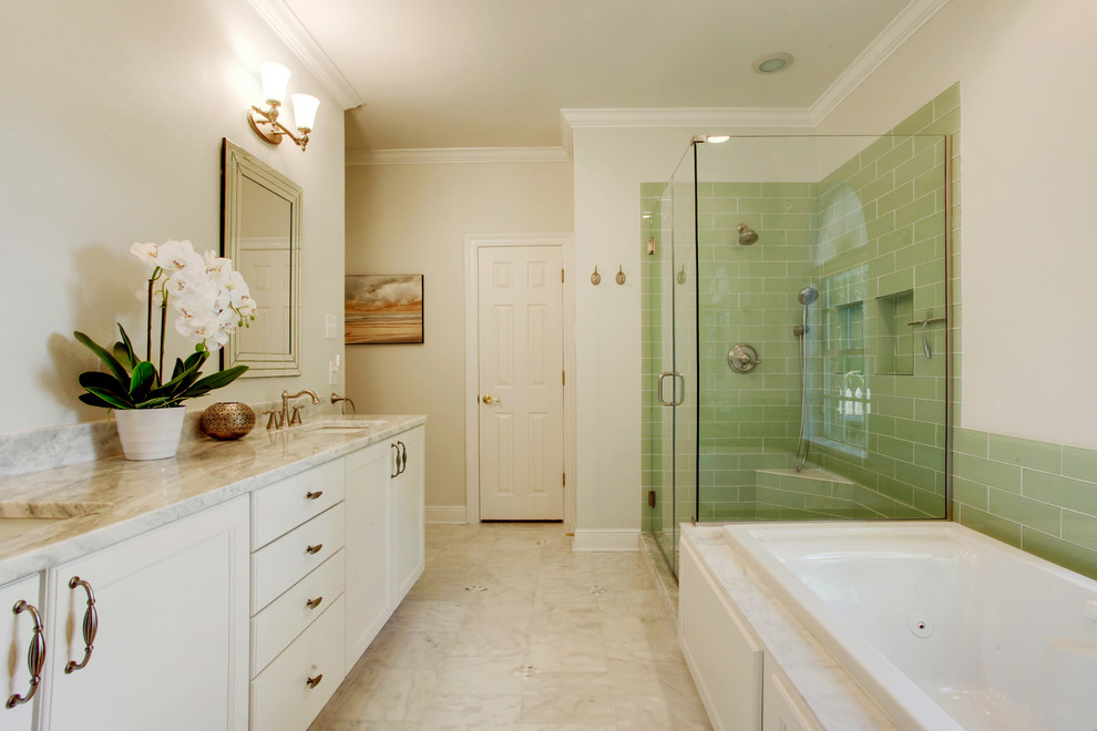 This is an example of a medium sized classic ensuite bathroom in New Orleans with shaker cabinets, white cabinets, a built-in bath, a corner shower, marble tiles, beige walls, marble flooring, a submerged sink and quartz worktops.
