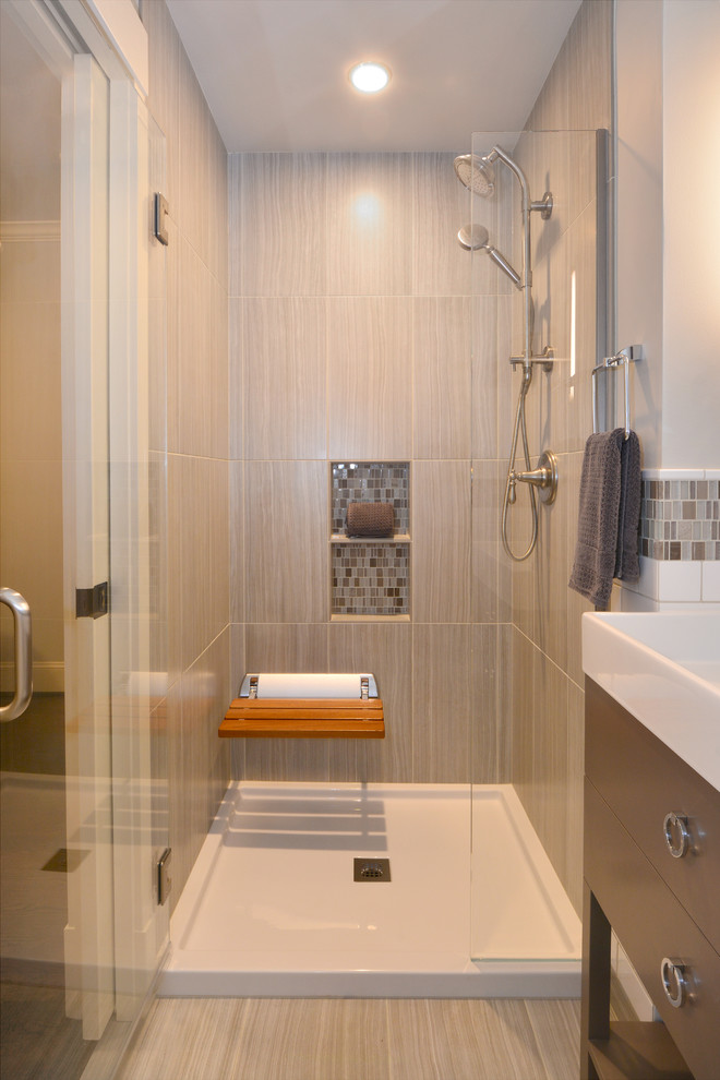 Example of a small minimalist 3/4 white tile and ceramic tile porcelain tile bathroom design in Seattle with flat-panel cabinets, gray cabinets, a one-piece toilet, gray walls, a console sink and solid surface countertops