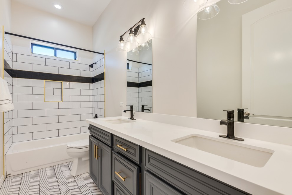 Inspiration for a mid-sized timeless 3/4 black and white tile and porcelain tile porcelain tile and white floor bathroom remodel in Phoenix with raised-panel cabinets, gray cabinets, gray walls, an undermount sink, quartz countertops and white countertops