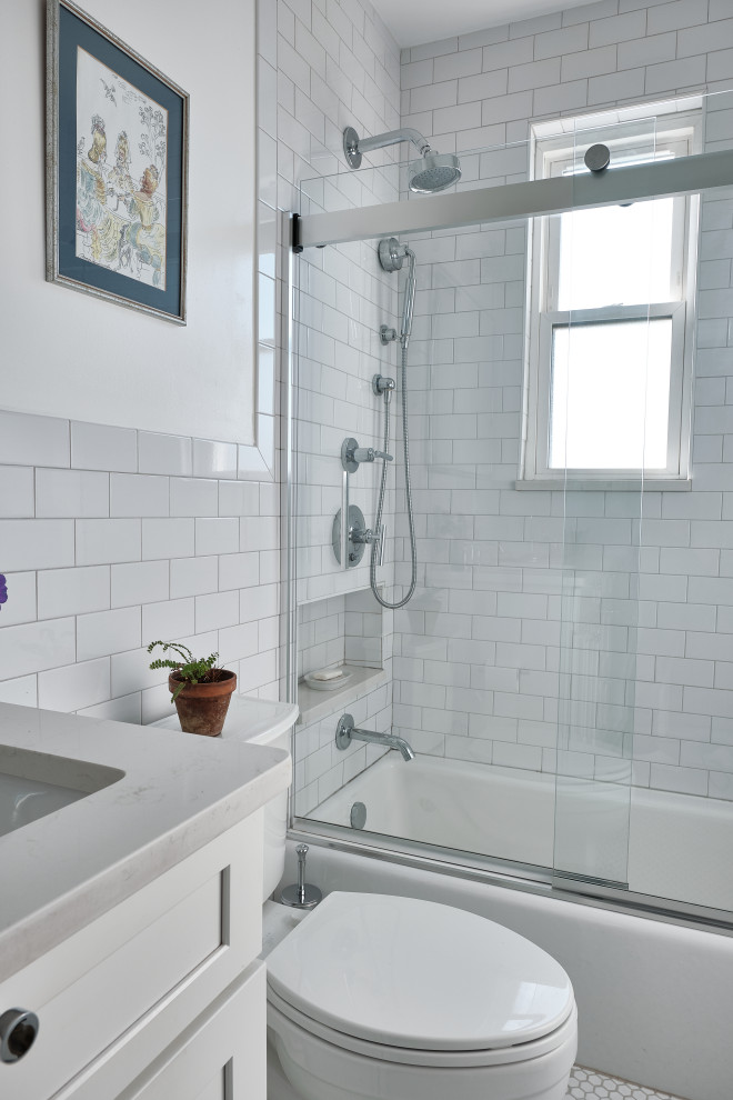 Bathroom - mid-sized modern 3/4 white tile and subway tile mosaic tile floor, white floor and single-sink bathroom idea in New York with shaker cabinets, white cabinets, a two-piece toilet, white walls, an undermount sink, quartzite countertops, white countertops and a built-in vanity